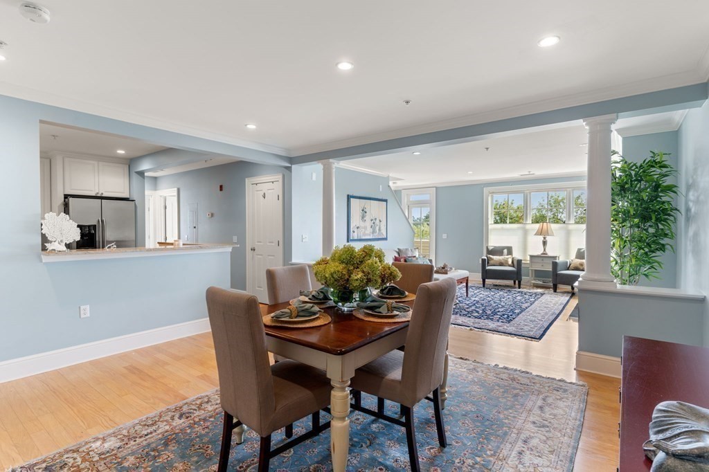 39 Intrepid Circle, Unit 302 Marblehead, MA 01945 - Photo 6 of 32 a view of a dining room with furniture