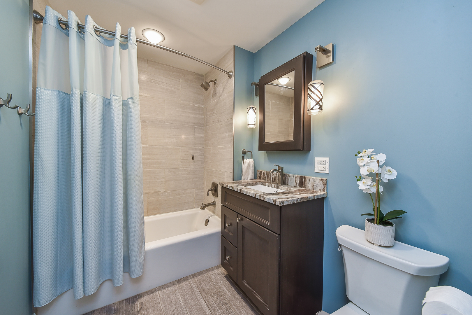 27W355 Mack Road Wheaton, IL 60189 - Photo 19 of 22 a bathroom with a granite countertop sink toilet and shower
