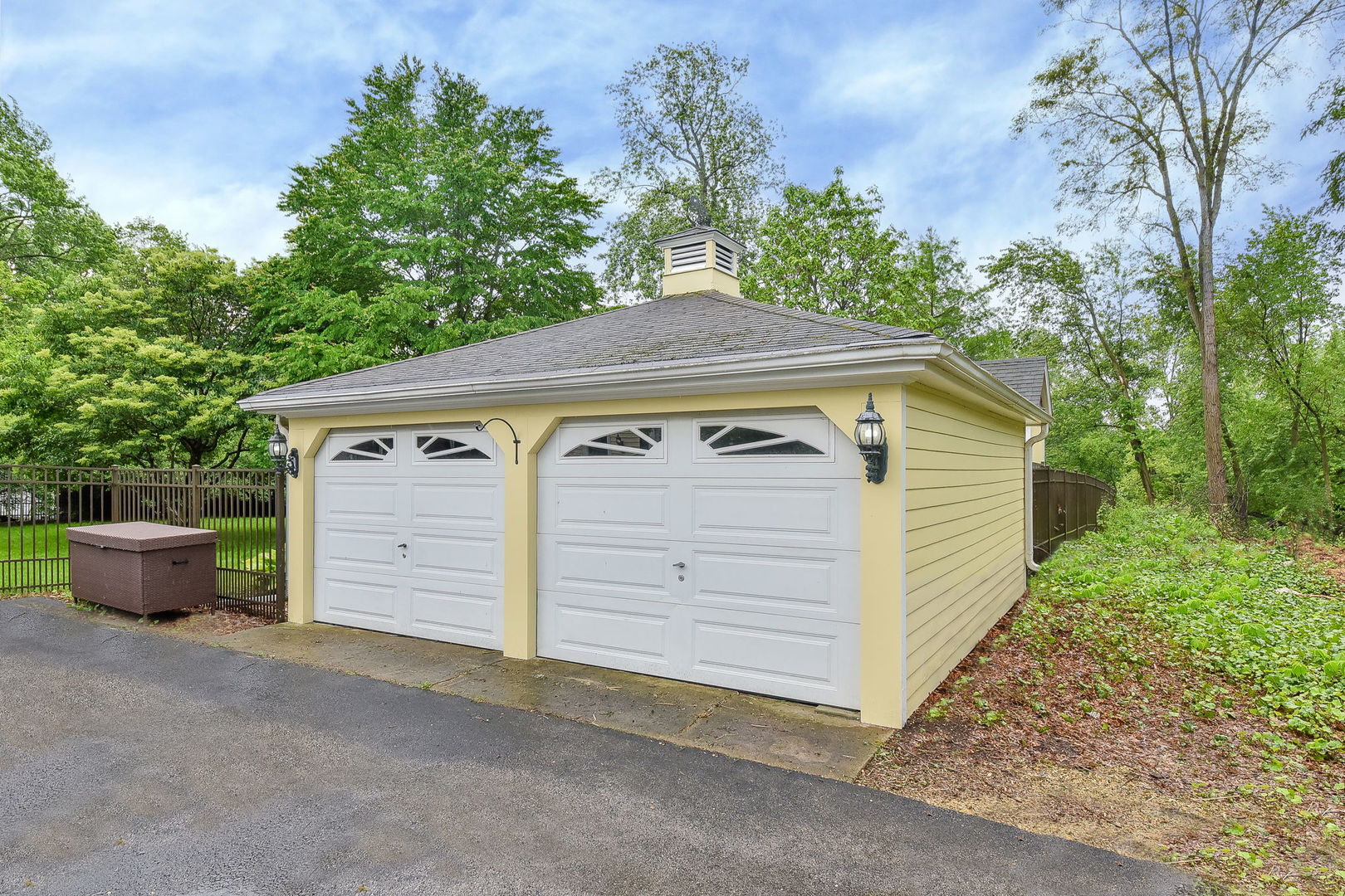 27W355 Mack Road Wheaton, IL 60189 - Photo 20 of 22 a front view of a house with garage