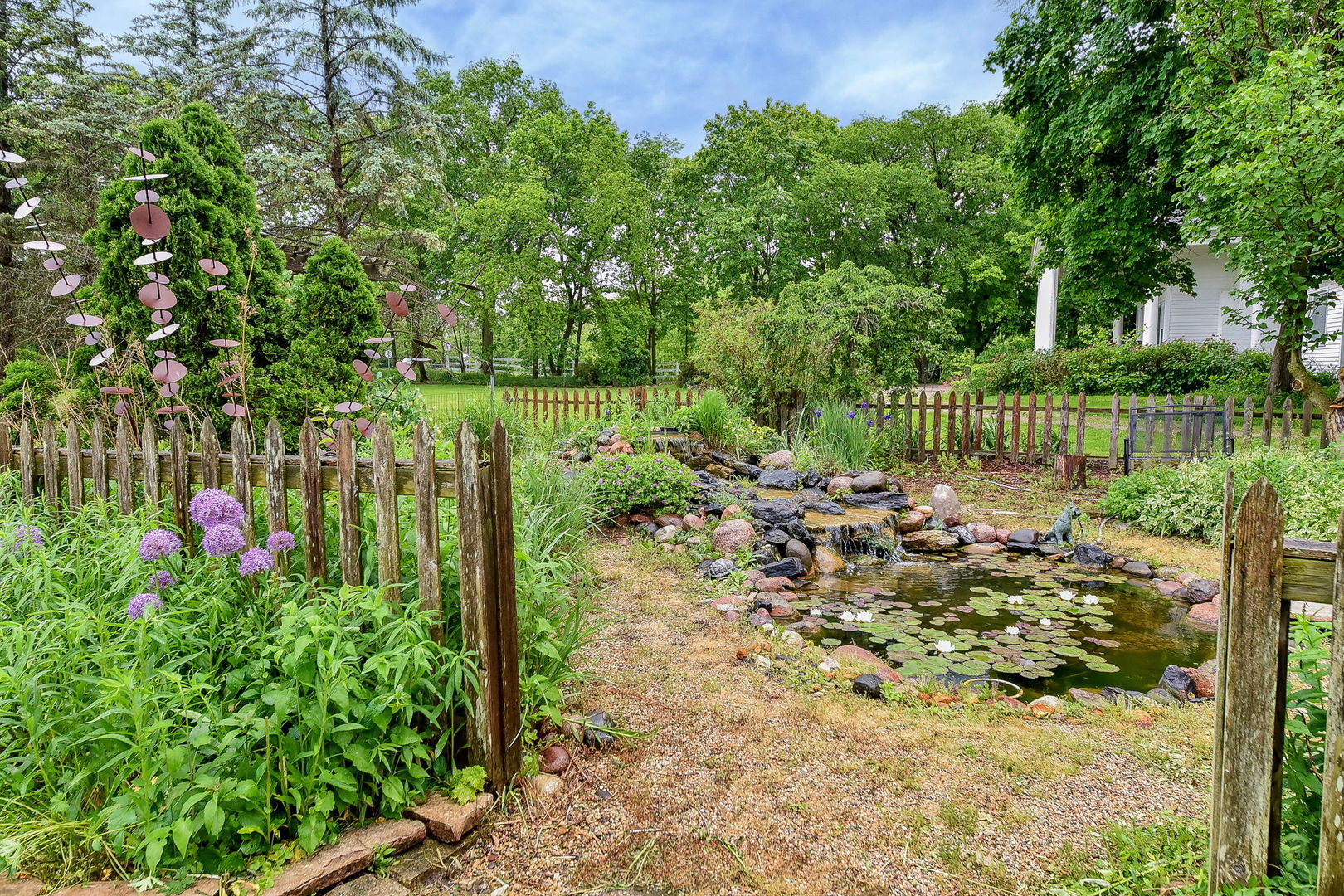 27W355 Mack Road Wheaton, IL 60189 - Photo 3 of 22 a view of a chair and table in the garden