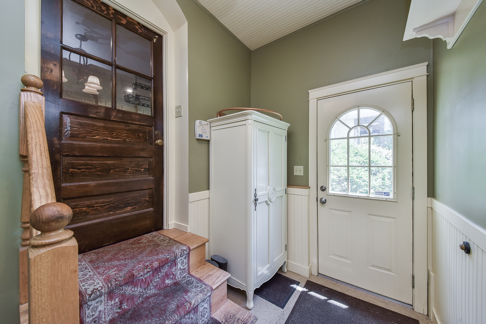 27W355 Mack Road Wheaton, IL 60189 - Photo 6 of 22 a view of entryway with wooden floor and stairs