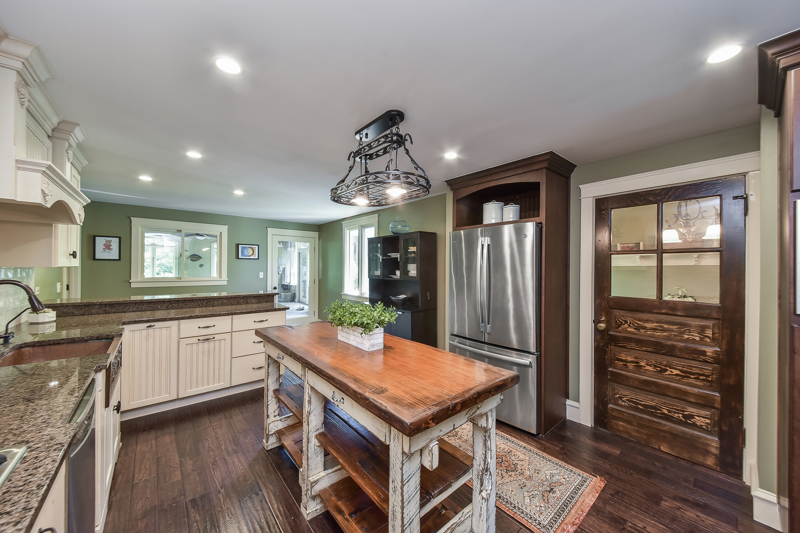 27W355 Mack Road Wheaton, IL 60189 - Photo 8 of 22 a kitchen with a stove a sink dishwasher and a refrigerator with wooden floor