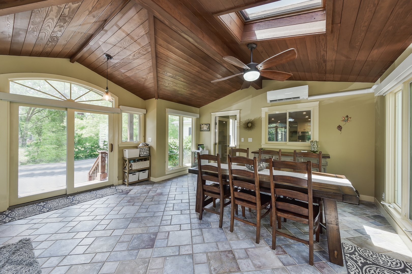 27W355 Mack Road Wheaton, IL 60189 - Photo 10 of 22 a view of a dining room with furniture window and outside view