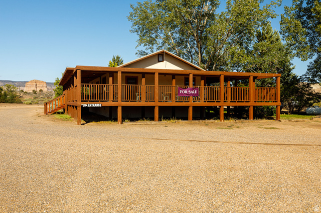 2040 North Long Cyn Road Kanab, UT 84741 - Photo 17 of 23 View of front of house featuring a porch