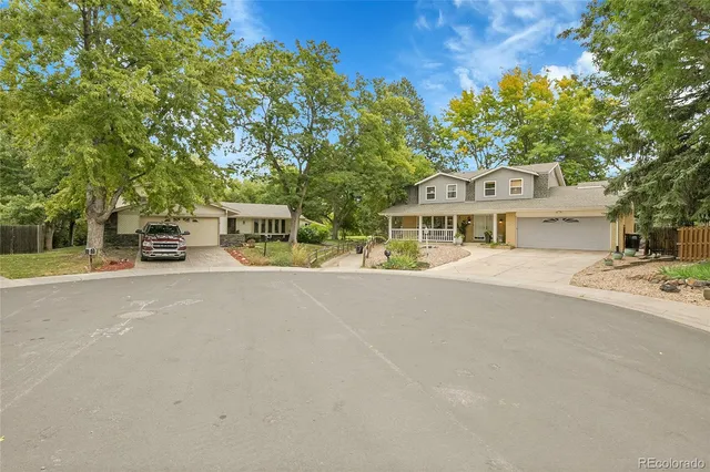 a view of house with outdoor space and street view
