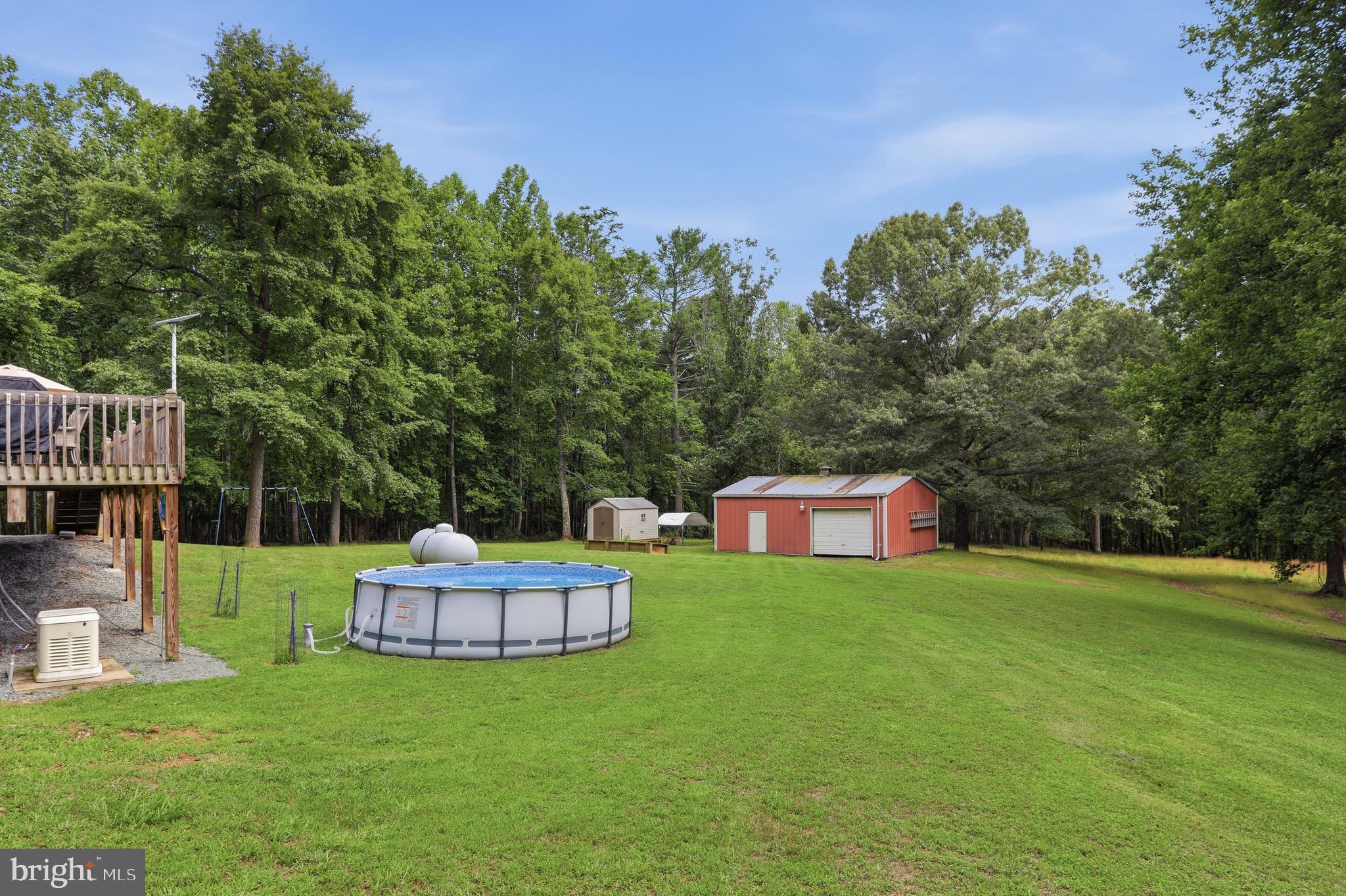 78 Lizzie Mills Road Castleton, VA 22716 - Photo 41 of 53 Above ground pool with surrounding yard