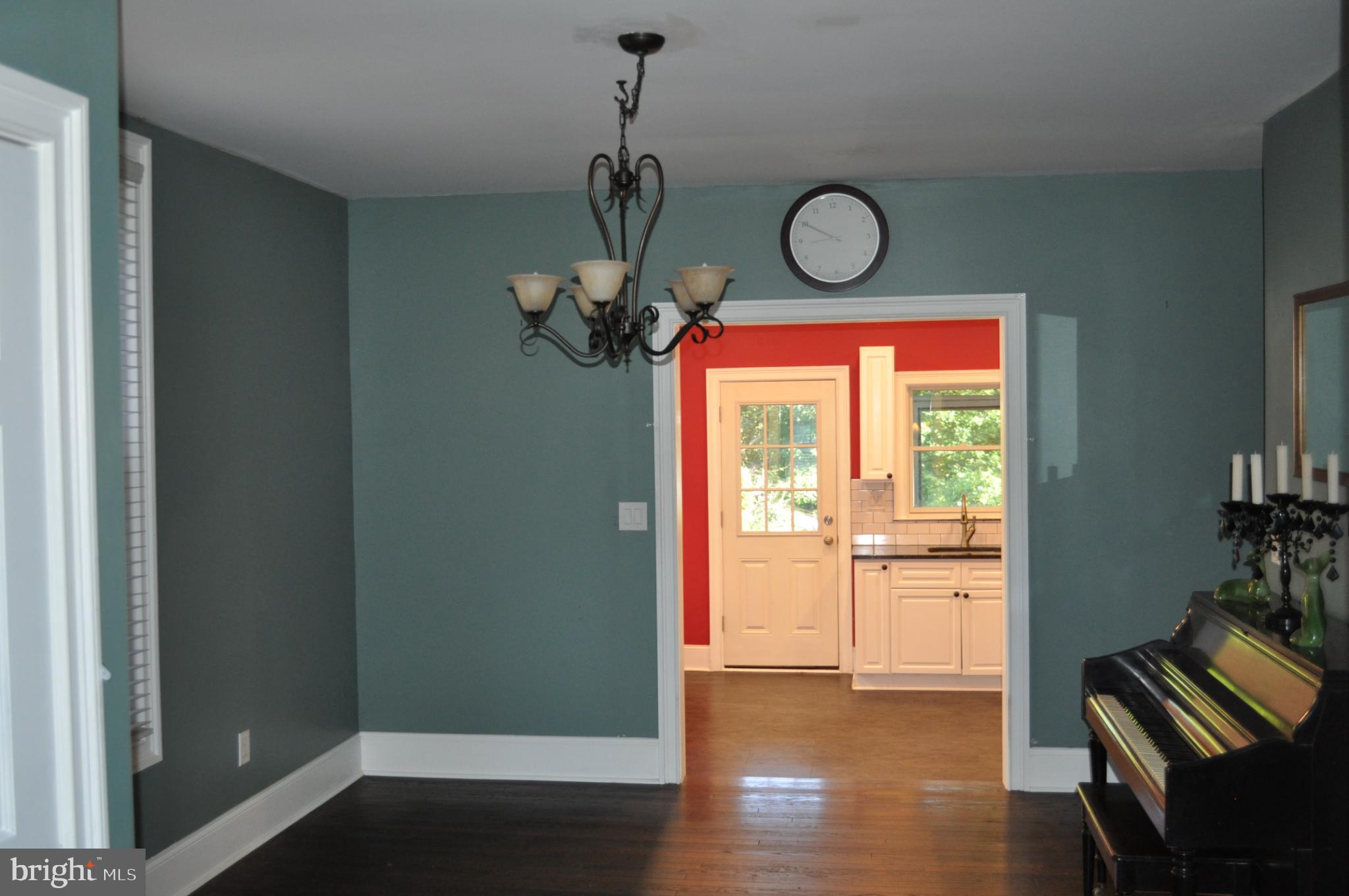 256 Chestnut Street Spring City, PA 19475 - Photo 5 of 12 an empty room with wooden floor and windows