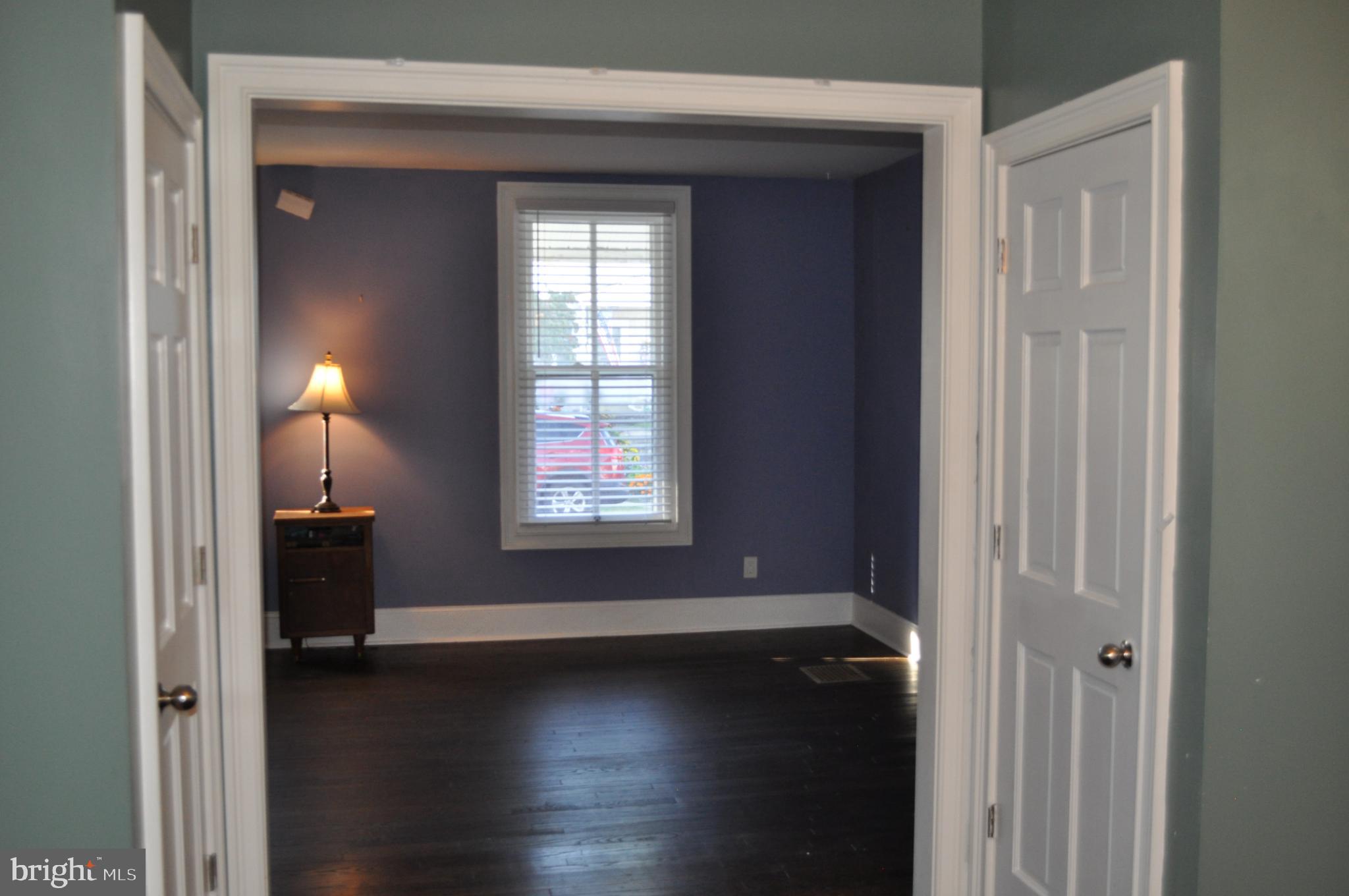 256 Chestnut Street Spring City, PA 19475 - Photo 8 of 12 an empty room that has a window in it