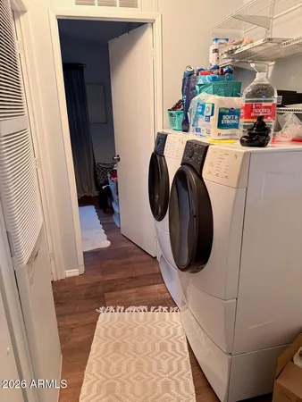 a utility room with dryer and washer