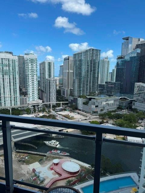 90 Southwest 3rd Street, Unit 3112 Miami, FL 33130 - Photo 2 of 42 a room with furniture and a floor to ceiling window