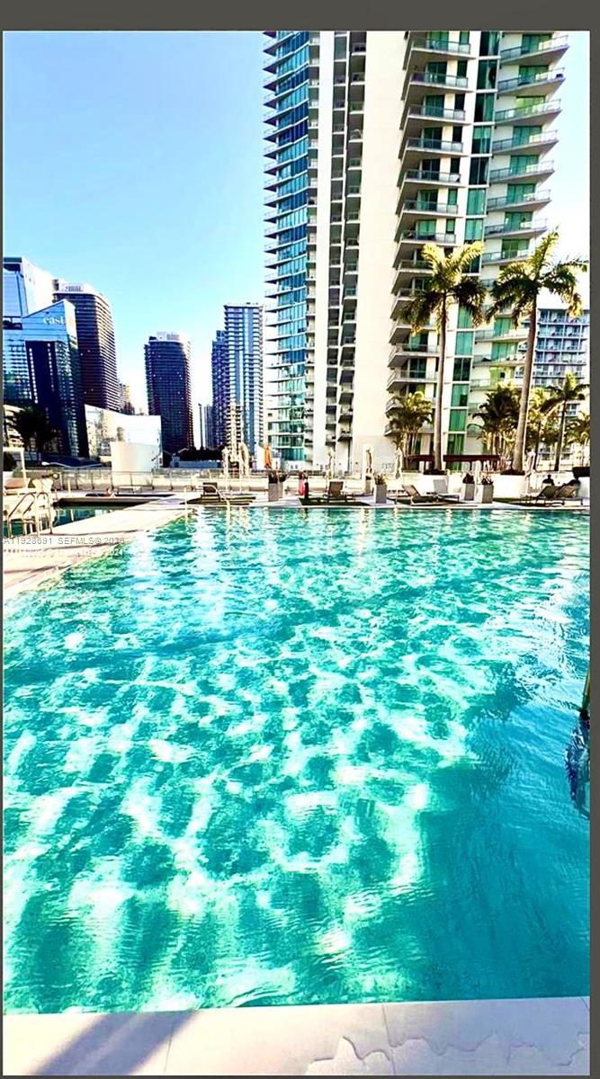 90 Southwest 3rd Street, Unit 3112 Miami, FL 33130 - Photo 29 of 42 a view of swimming pool from a kitchen
