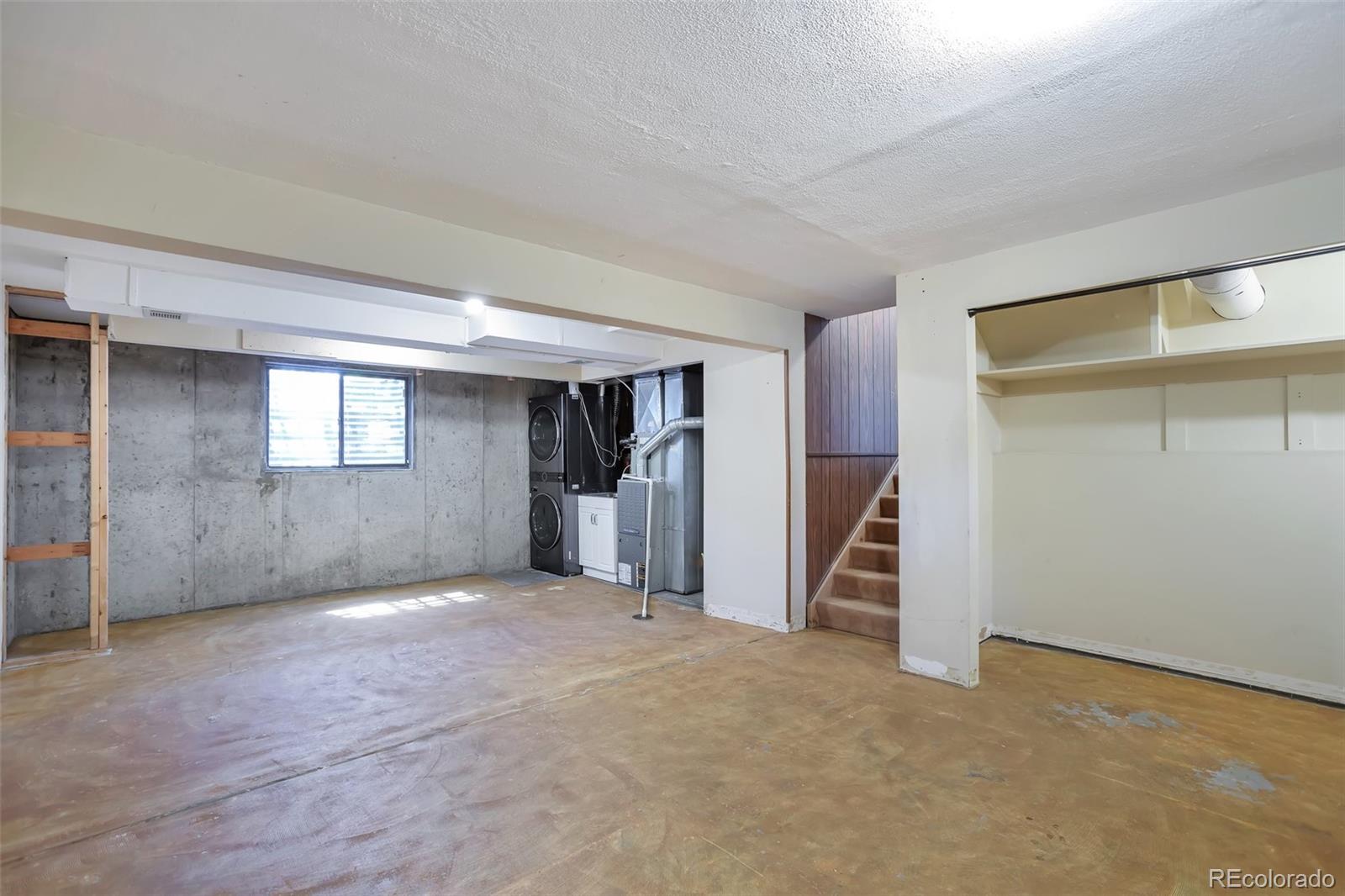 14808 East Tufts Avenue Aurora, CO 80015 - Photo 20 of 25 a view of empty room with stairs