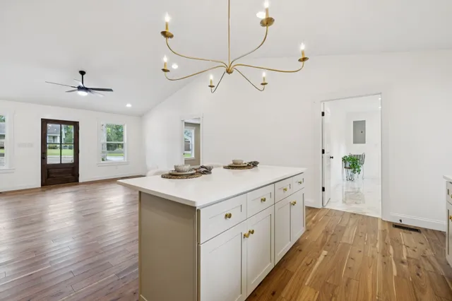 a view of a two chairs in the balcony