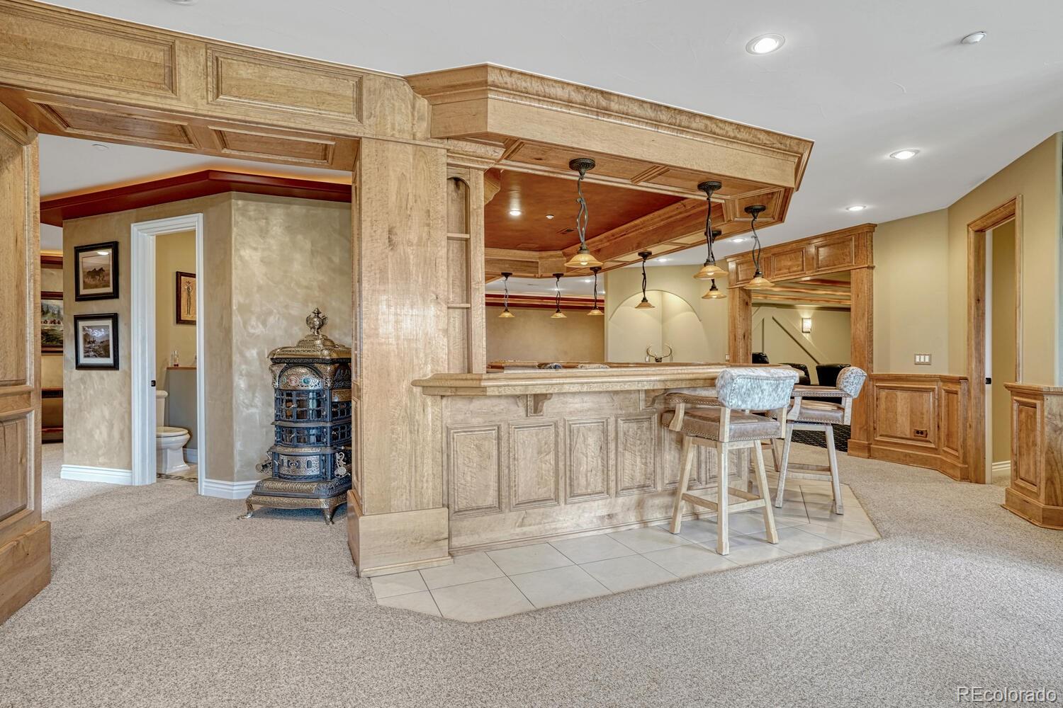 3851 Castle Butte Drive Castle Rock, CO 80109 - Photo 28 of 50 a view of a kitchen with table and chairs