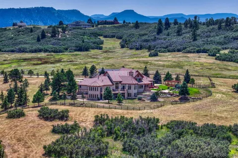 an aerial view of residential houses and outdoor space