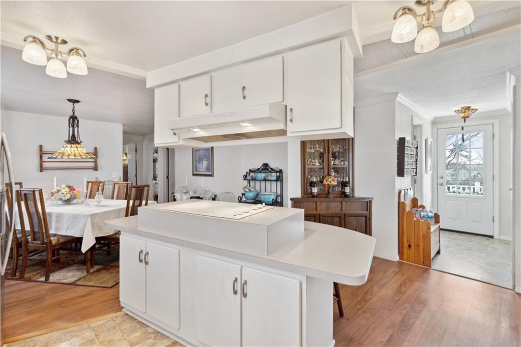 476 Cecil-Henderson Road Cecil, PA 15321 - Photo 12 of 37 a large white kitchen with lots of counter space and breakfast area