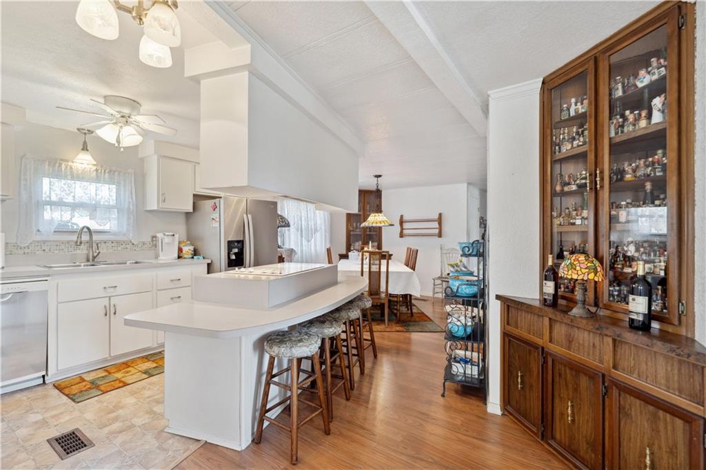 476 Cecil-Henderson Road Cecil, PA 15321 - Photo 13 of 37 a large kitchen with kitchen island a large island in it