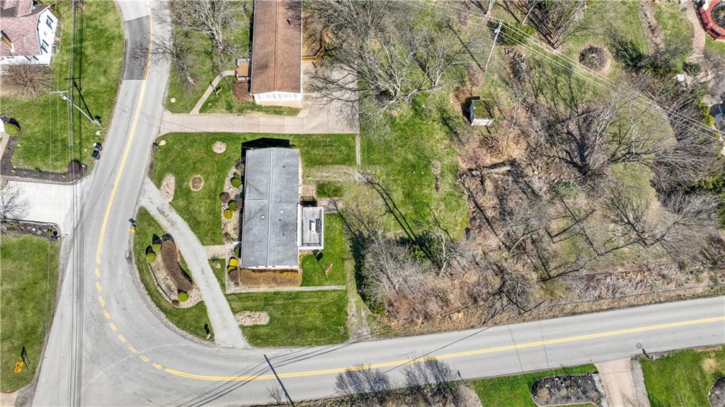 476 Cecil-Henderson Road Cecil, PA 15321 - Photo 27 of 37 an aerial view of a house with garden space and trees