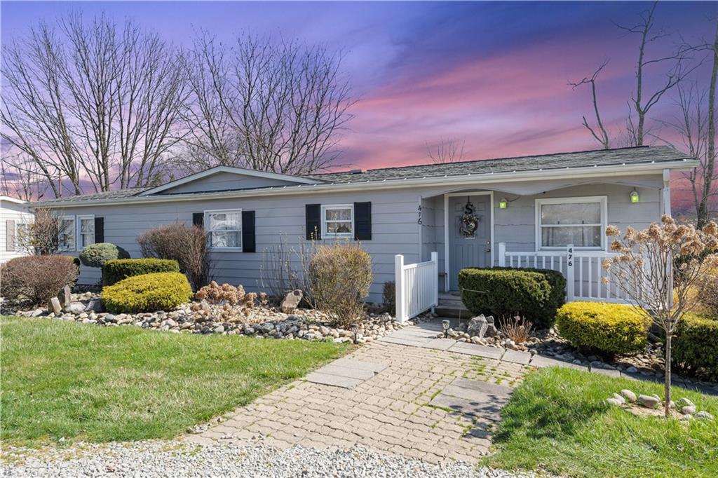 476 Cecil-Henderson Road Cecil, PA 15321 - Photo 34 of 37 a front view of a house with garden