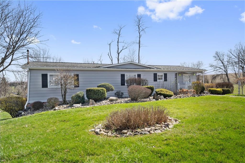 476 Cecil-Henderson Road Cecil, PA 15321 - Photo 36 of 37 a front view of a house with a yard