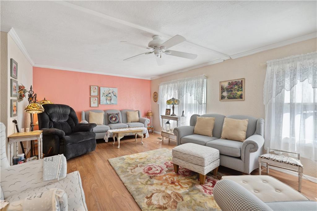 476 Cecil-Henderson Road Cecil, PA 15321 - Photo 6 of 37 a living room with furniture or couch and a window