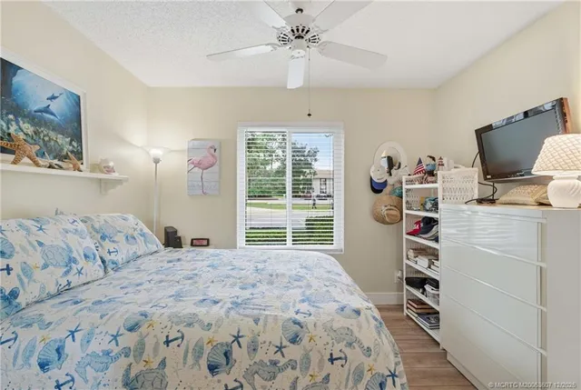 a bathroom with a sink and mirror with toilet