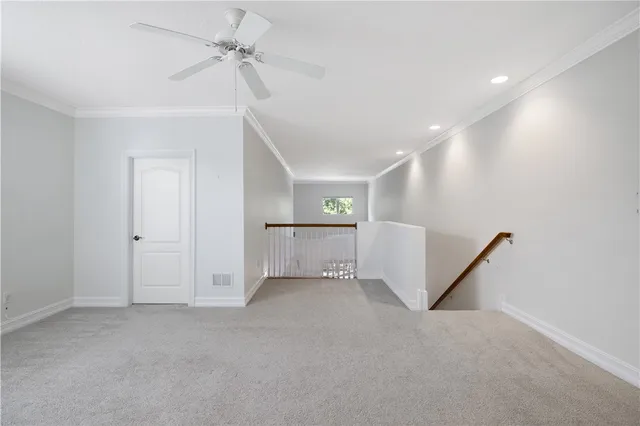 an empty room with a windows