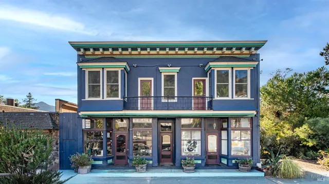 a front view of a building with street