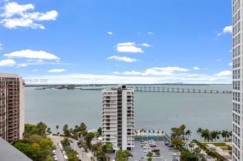 a view of a lake and a city