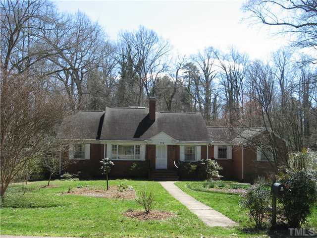719 Runnymede Road Raleigh, NC 27607 - Photo 1 of 25 a front view of a house with a yard