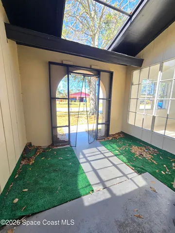 a view of a yard in front of a house