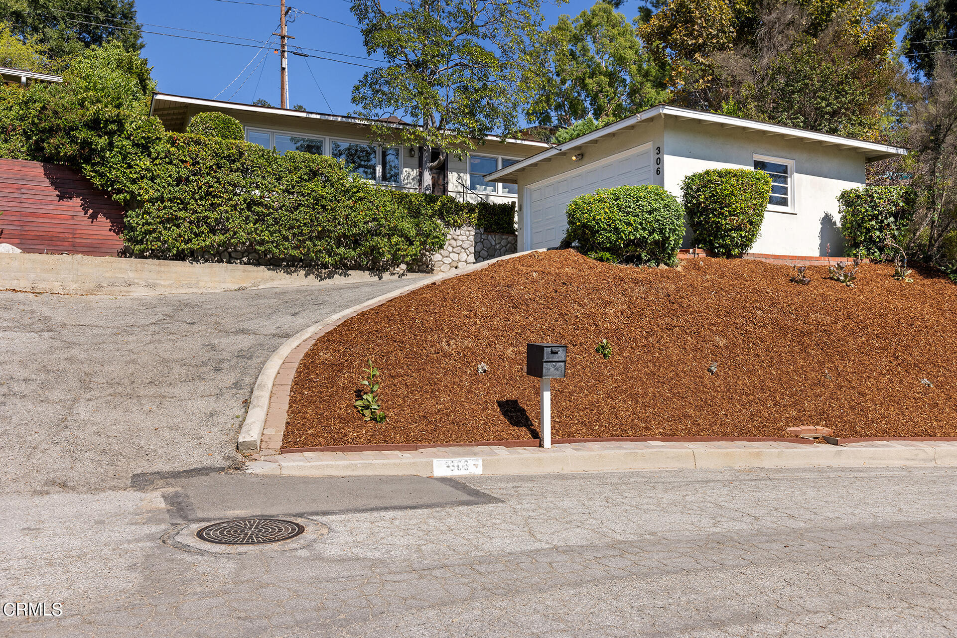 306 Cherry Drive Pasadena, CA 91105 - Photo 22 of 23 a front view of a house with a yard