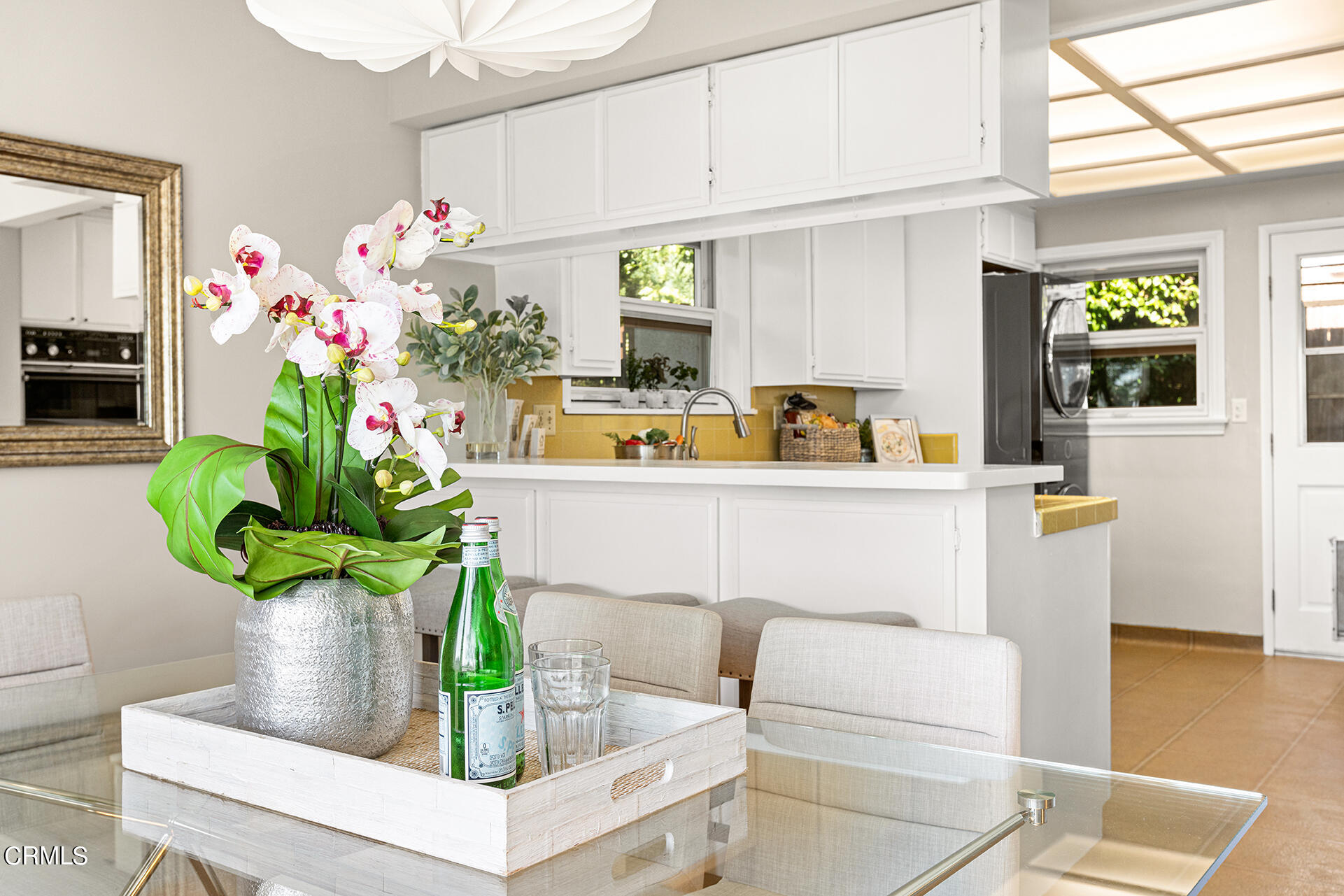 306 Cherry Drive Pasadena, CA 91105 - Photo 6 of 23 a dining room with furniture and flowers