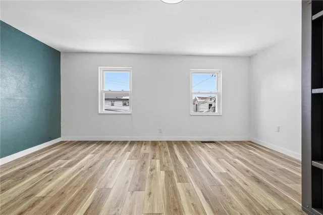 a view of room with window and stairs