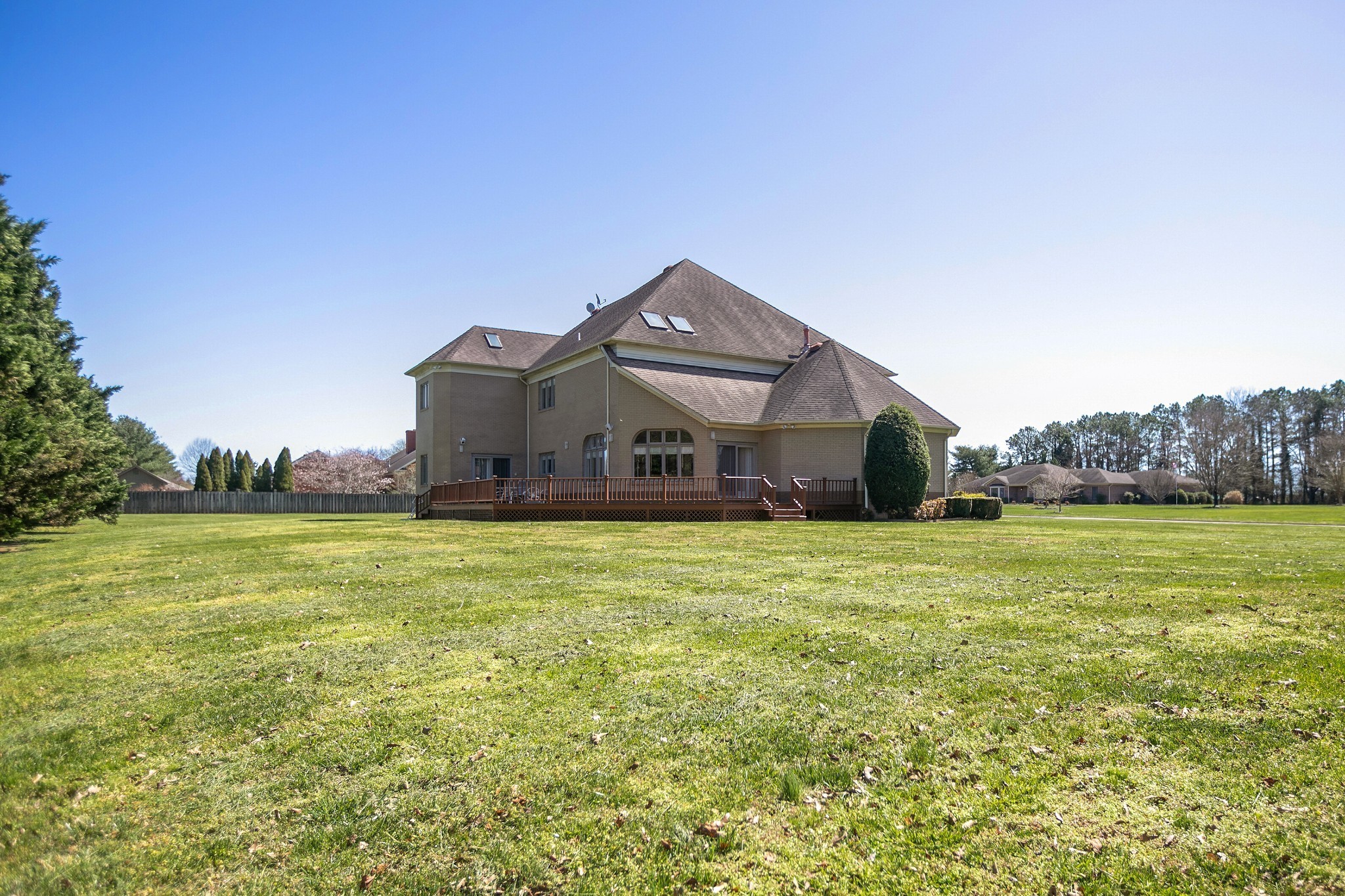 970 9th Street Lawrenceburg, TN 38464 - Photo 14 of 50 a front view of a house with a garden and yard