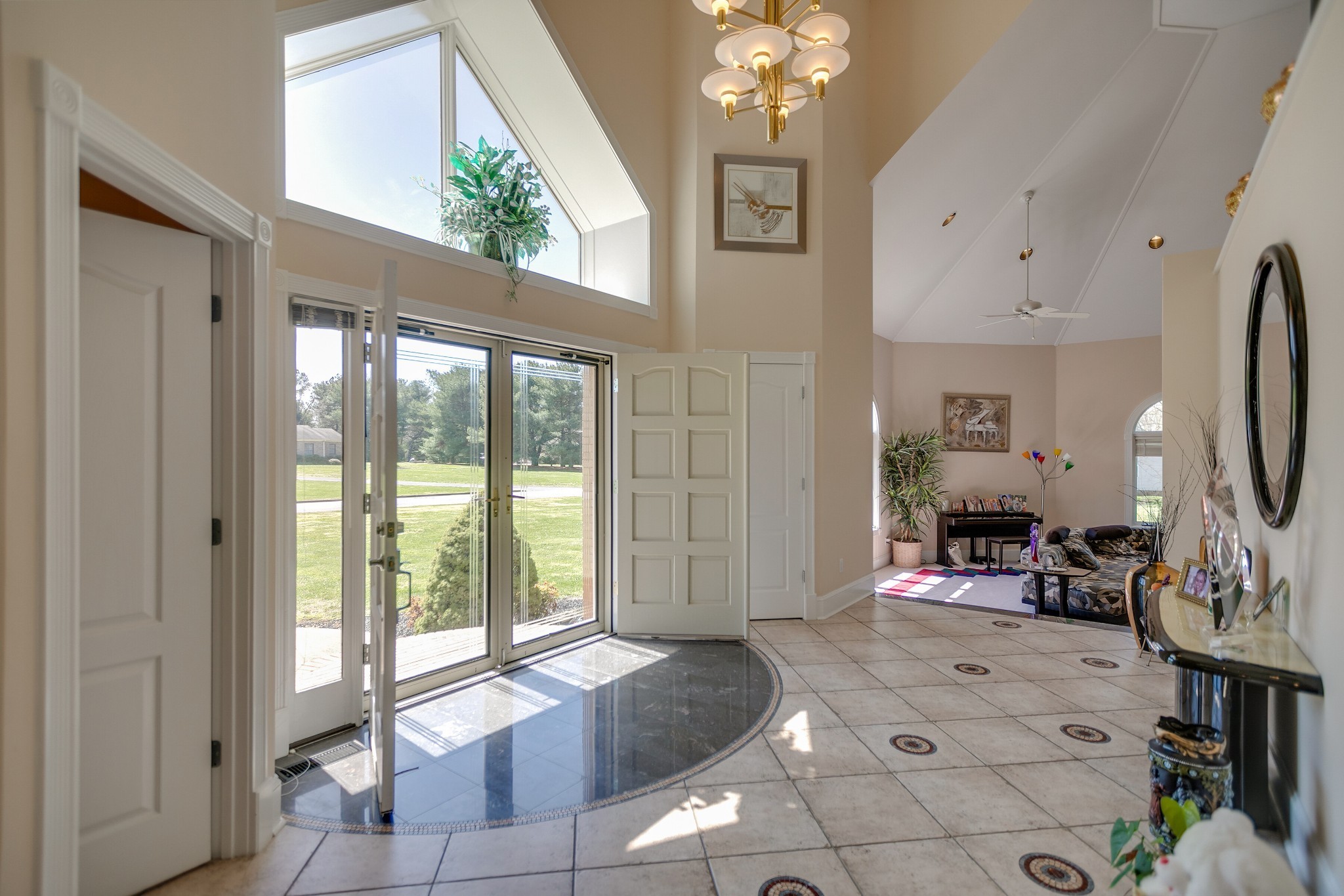 970 9th Street Lawrenceburg, TN 38464 - Photo 15 of 50 a view of a livingroom with furniture hardwood floor and a large window