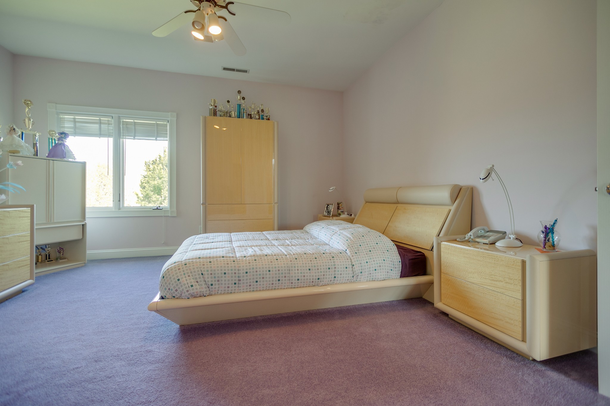 970 9th Street Lawrenceburg, TN 38464 - Photo 42 of 50 a bedroom with a bed and a chandelier