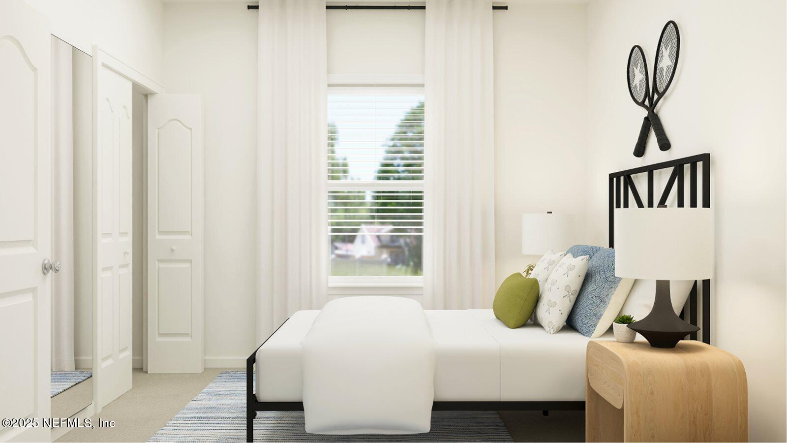 81 Pentwater Road St. Augustine, FL 32092 - Photo 29 of 38 a bedroom with a bed and a window