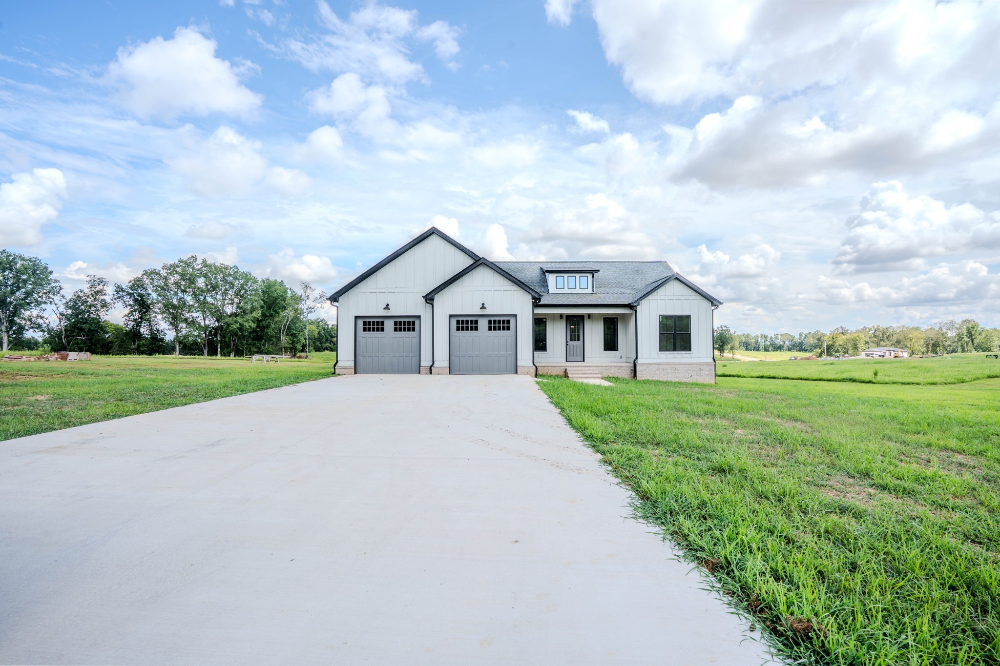 a front view of a house with yard