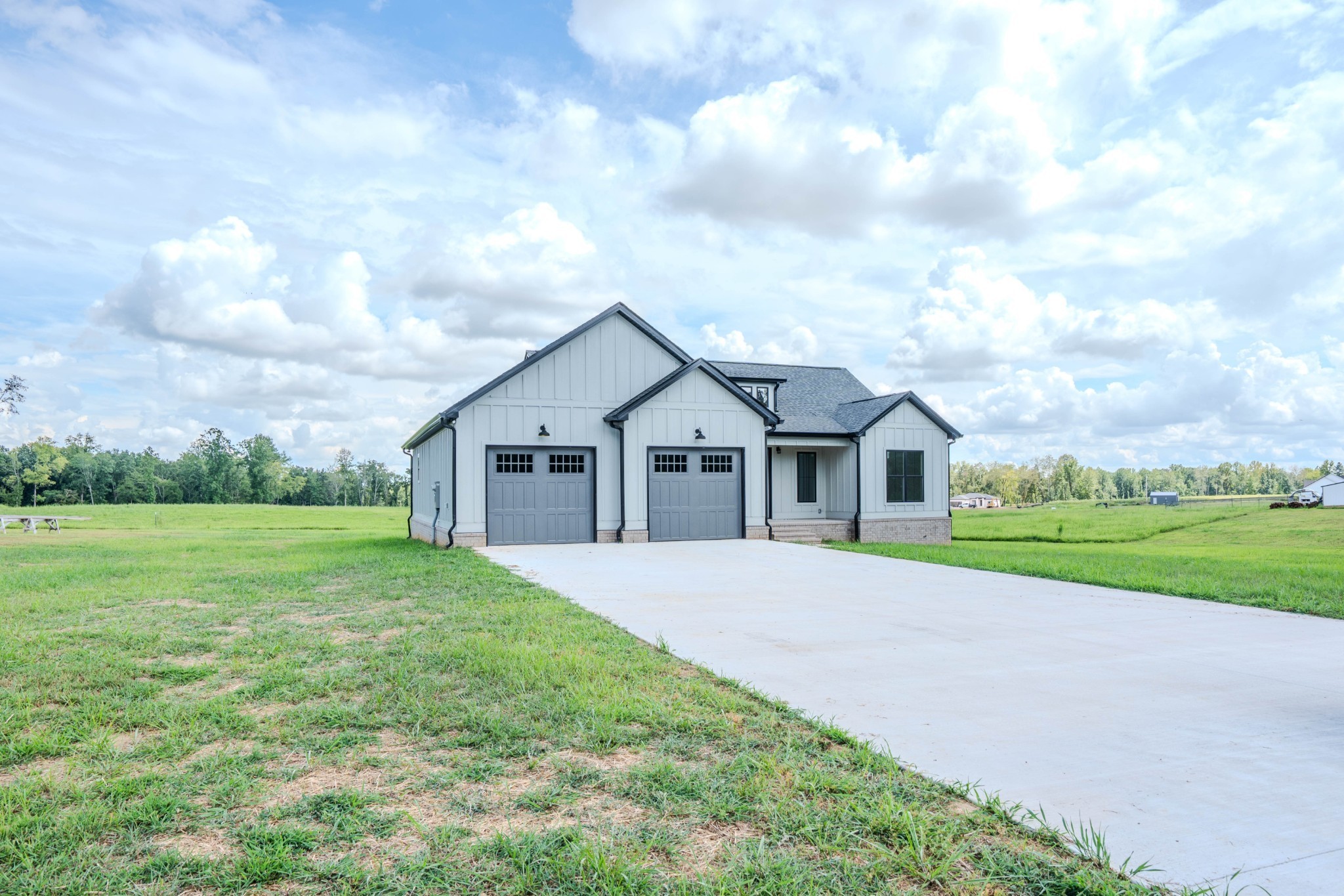 176 Beartown Road Loretto, TN 38469 - Photo 3 of 46 a front view of house with yard and green space