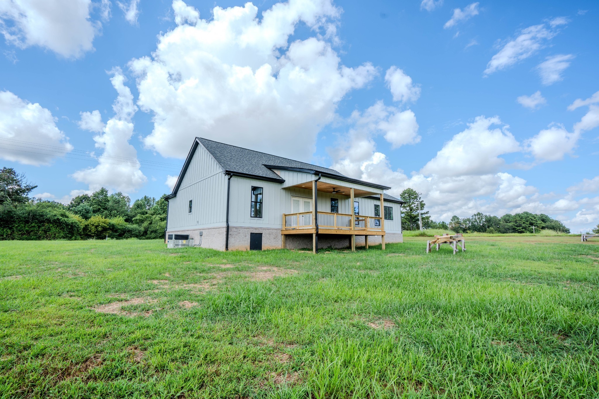 176 Beartown Road Loretto, TN 38469 - Photo 6 of 46 a view of a house with backyard and garden