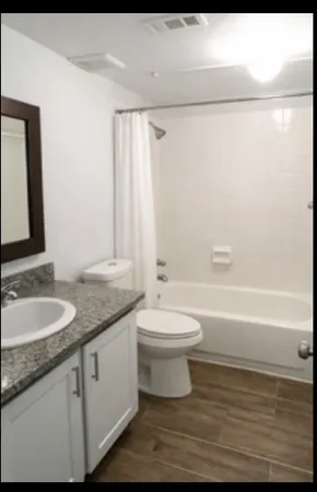 a view of a hallway with workspace