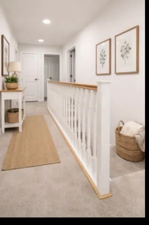 a view of a hallway with a couch