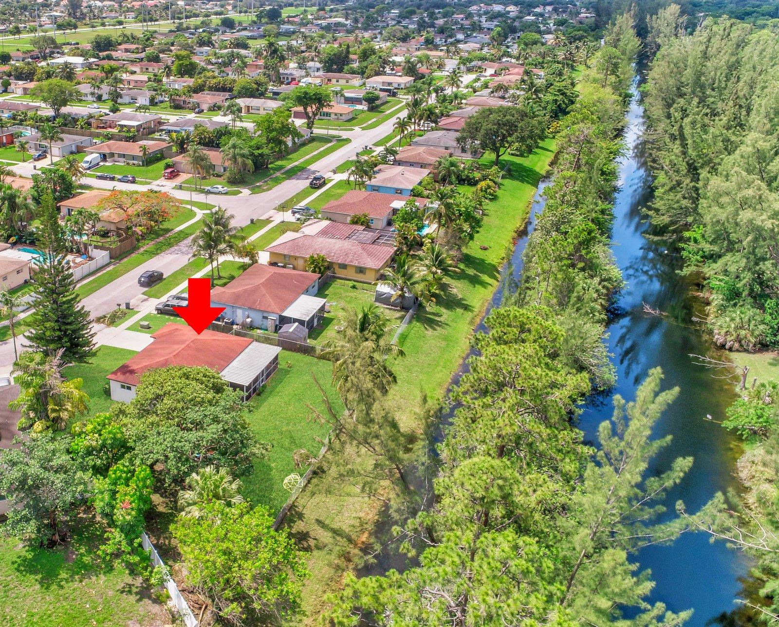 22047 Caldera Avenue Boca Raton, FL 33428 - Photo 54 of 61 an aerial view of residential houses with outdoor space and trees