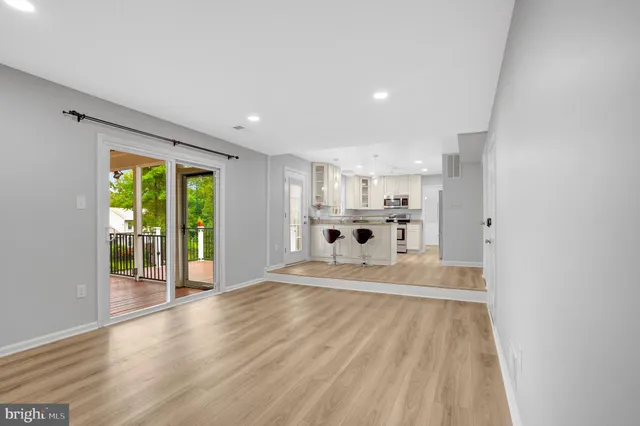 a view of kitchen with furniture and window
