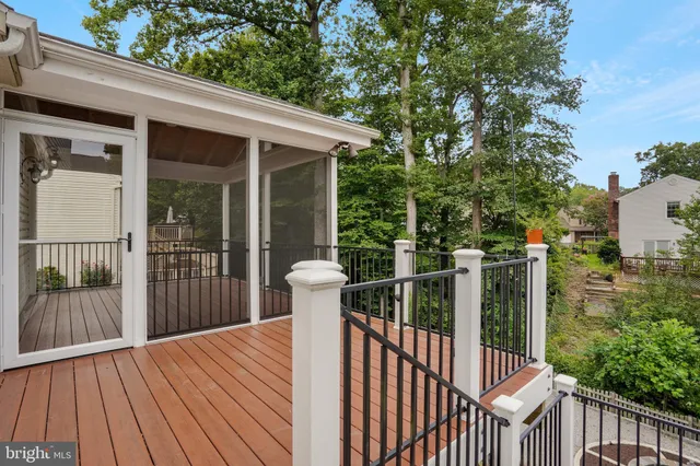a view of a balcony with wooden floor