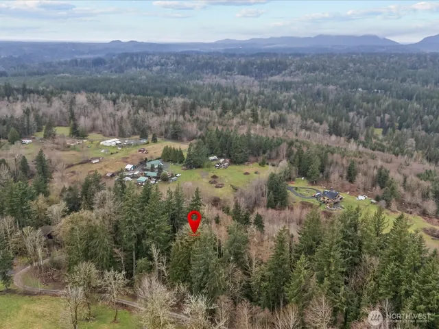 a view of a balcony with an outdoor space and mountain view