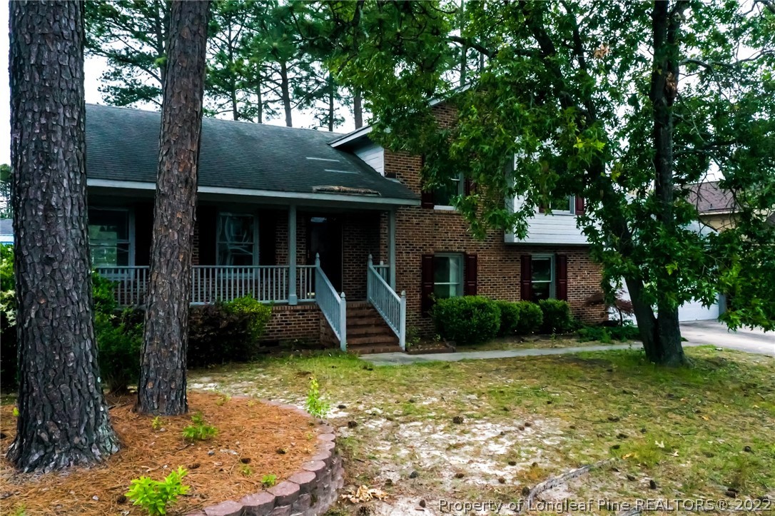 1810 Nuthatch Road Fayetteville, NC 28304 - Photo 1 of 37 a view of a house with a yard
