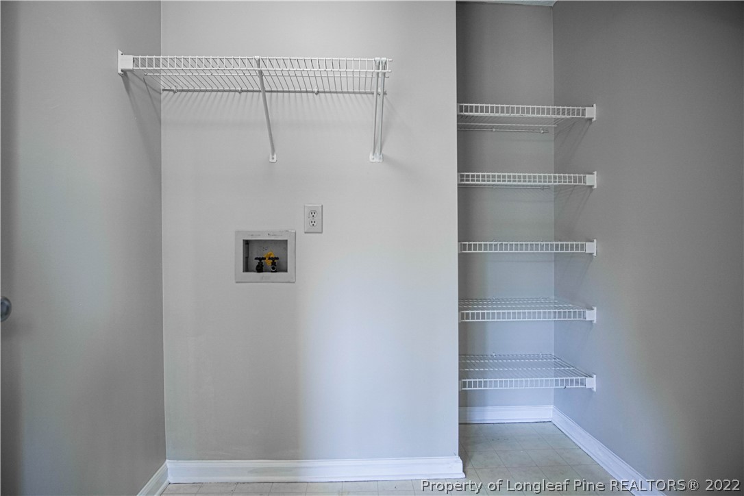 1810 Nuthatch Road Fayetteville, NC 28304 - Photo 11 of 37 a view of a walk in closet
