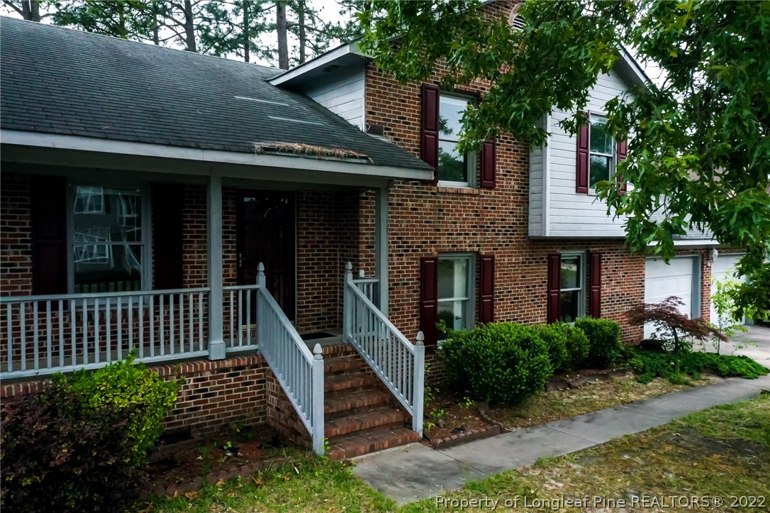 1810 Nuthatch Road Fayetteville, NC 28304 - Photo 33 of 37 a view of a house with a yard